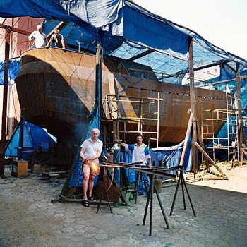 Boat builders who hope to circumnavigate the globe, at Lazarus shelter for homeless men, former Ursus Tractor Factory